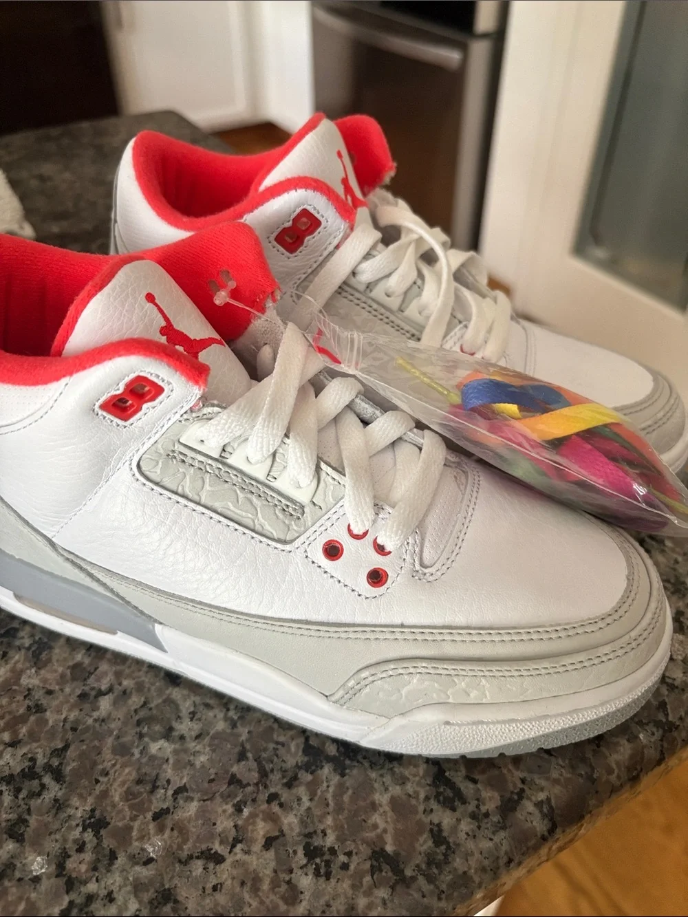 Jordan Kids White and Crimson High Top Sneakers
